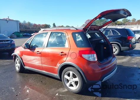 2009 Suzuki Sx4 Technology z USA, uszkodzony, nr VIN JS2YB413895100110